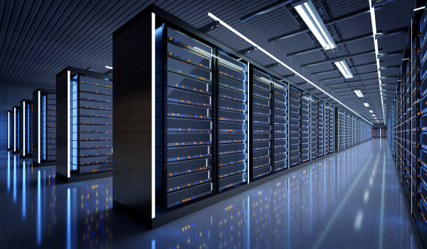 A server room for a data center with blue and orange led indicator lights.